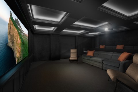 A home theater with a Sony projector and a large curved screen.