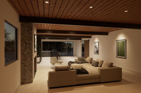 A modern living room with wooden ceilings and a stone fireplace illuminated by DMF LED lighting fixtures.