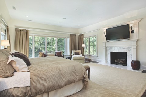 A modern home with in-ceiling speakers.