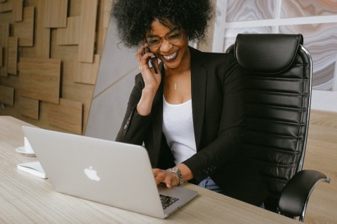 Woman on her laptop in an office.